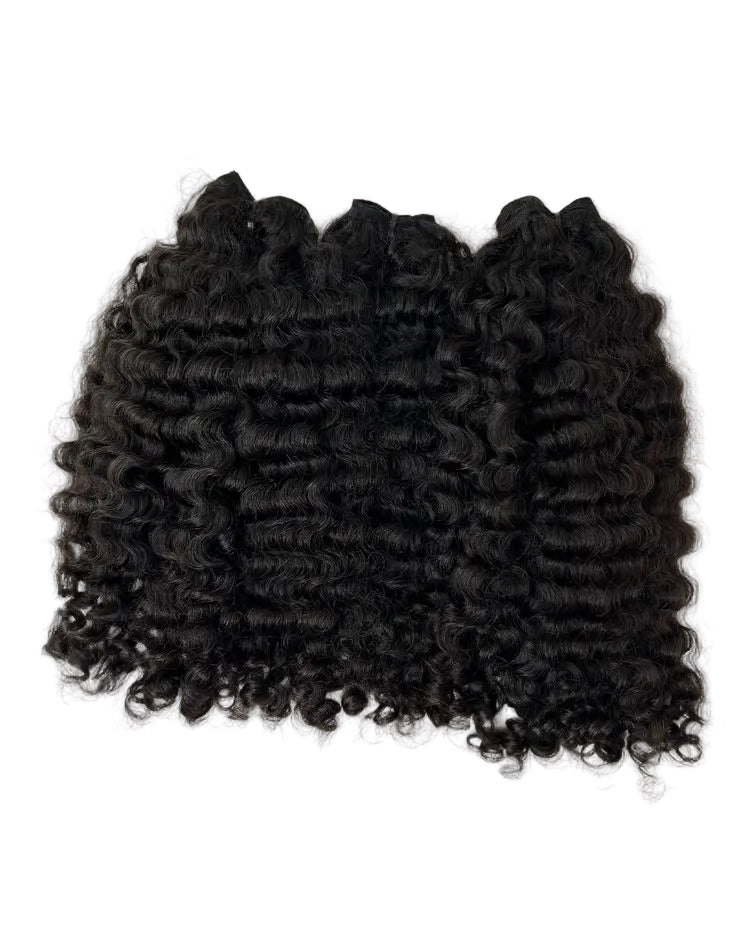 Black curly hair extensions on a white background